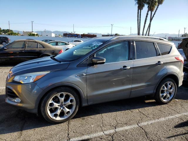 FORD ESCAPE TIT 2014 with VIN 1FMCU0JX0EUD01585 - Photo from auction