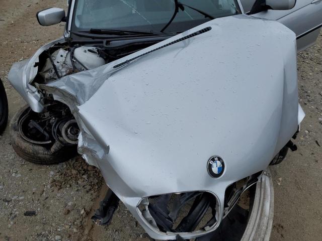 Photo 11 from auction – 2003 BMW 325 I with VIN WBAEV33463KL59544
