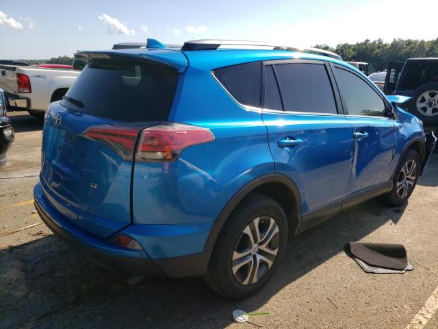 Photo 3 from auction – 2017 TOYOTA RAV4 LE with VIN JTMZFREV3HJ114238