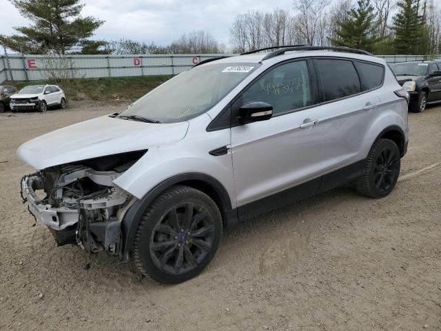 FORD ESCAPE TIT 2017 with VIN 1FMCU9J9XHUC23410 - Photo from auction