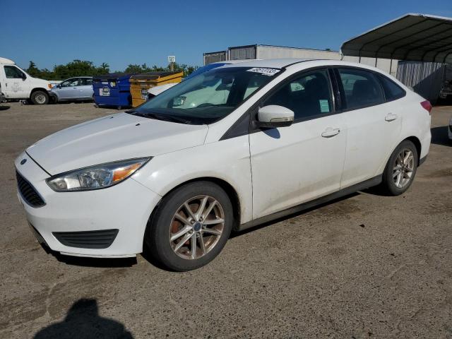 FORD FOCUS SE 2016 with VIN 1FADP3F26GL289780 - Photo from auction