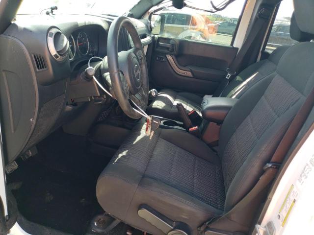 Photo 7 from auction – 2012 JEEP WRANGLER U with VIN 1C4BJWDG3CL242414