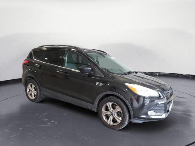 Photo 4 from auction – 2014 FORD ESCAPE SE with VIN 1FMCU9GXXEUB11384