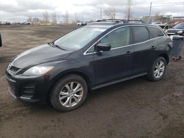 MAZDA CX-7 2011 with VIN JM3ER4C31B0385359 - Photo from auction