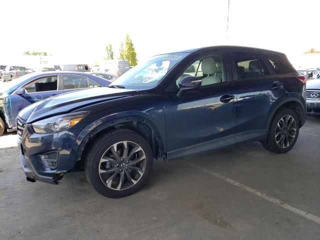 MAZDA CX-5 GT 2016 with VIN JM3KE4DY7G0692423 - Photo from auction