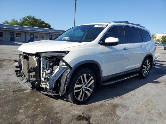 HONDA PILOT ELIT 2017 with VIN 5FNYF6H02HB020806 - Photo from auction