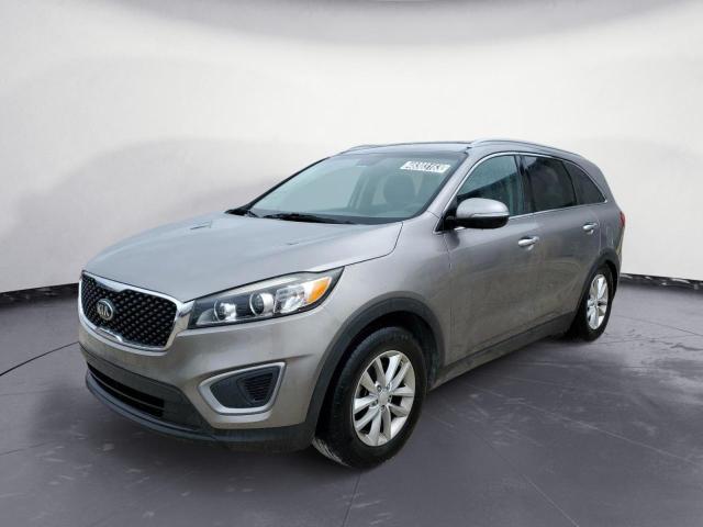 KIA SORENTO LX 2016 with VIN 5XYPG4A36GG176937 - Photo from auction