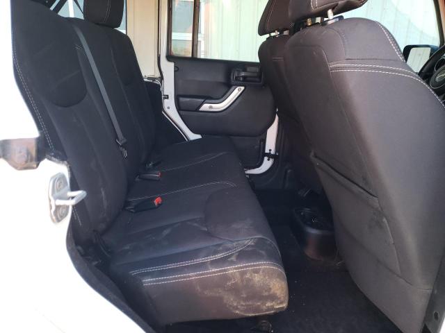 Photo 11 from auction – 2013 JEEP WRANGLER U with VIN 1C4BJWEG5DL652938