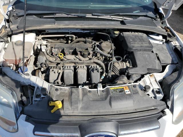 Photo 11 from auction – 2014 FORD FOCUS SE with VIN 1FADP3F29EL246774