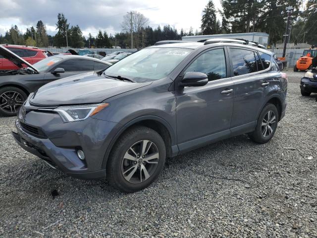 TOYOTA RAV4 ADVEN 2018 with VIN 2T3RFREV1JW802147 - Photo from auction