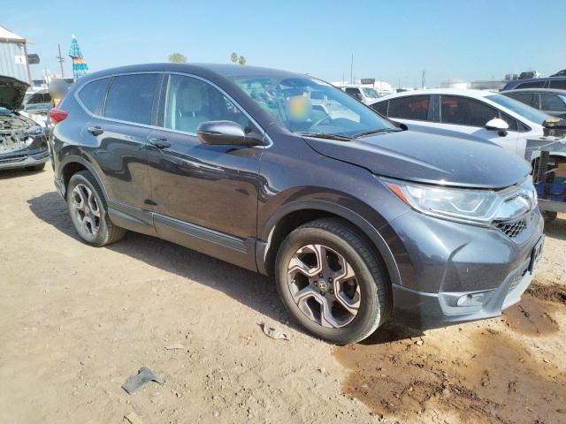 Photo 4 from auction – 2018 HONDA CR-V EX with VIN 7FARW2H51JE095774