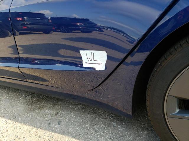 Photo 12 from auction – 2021 TESLA MODEL 3 with VIN 5YJ3E1EA1MF913332