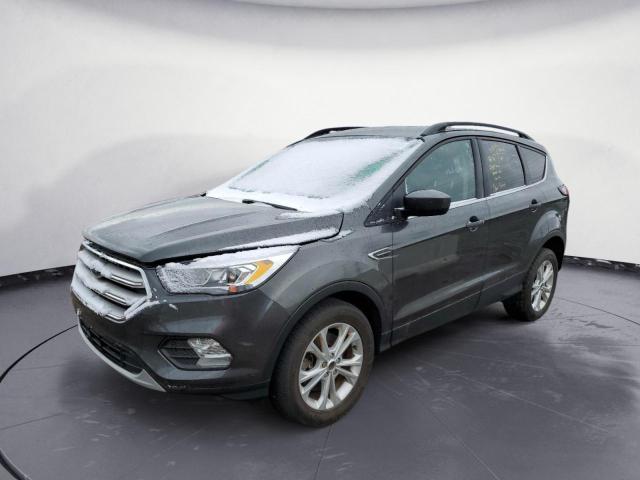 FORD ESCAPE SEL 2018 with VIN 1FMCU9HDXJUC78049 - Photo from auction