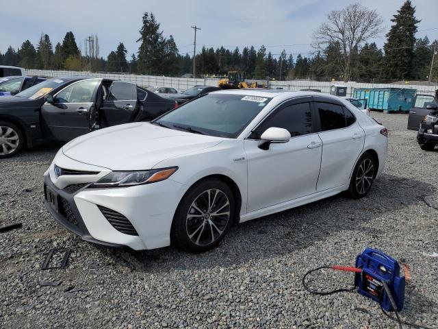 TOYOTA CAMRY HYBR 2018 with VIN 4T1B21HK6JU007202 - Photo from auction