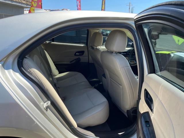 Photo 6 from auction – 2014 CHEVROLET MALIBU 1LT with VIN 1G11C5SL5EF271519