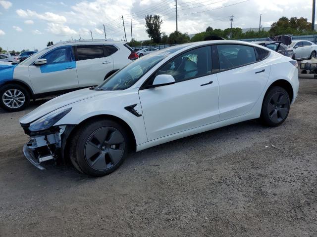 TESLA MODEL 3 2023 with VIN 5YJ3E1EA6PF464377 - Photo from auction