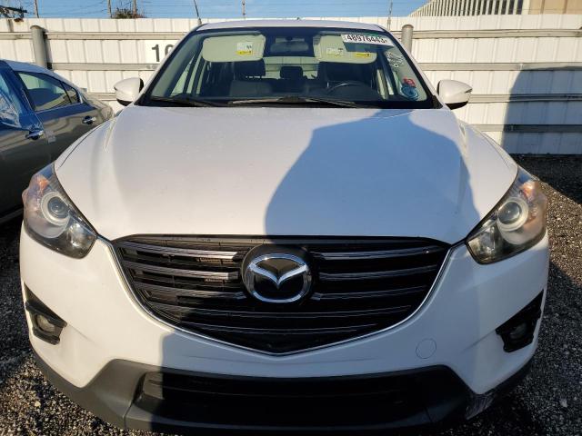 Photo 5 from auction – 2016 MAZDA CX-5 TOURI with VIN JM3KE2CY2G0766949