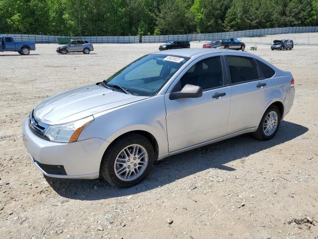 FORD FOCUS SE 2010 with VIN 1FAHP3FNXAW154903 - Photo from auction