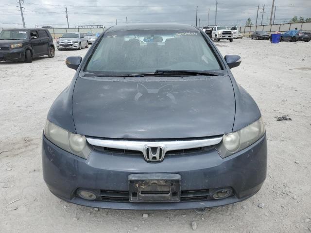 Photo 5 from auction – 2006 HONDA CIVIC HYBR with VIN JHMFA36236S030462