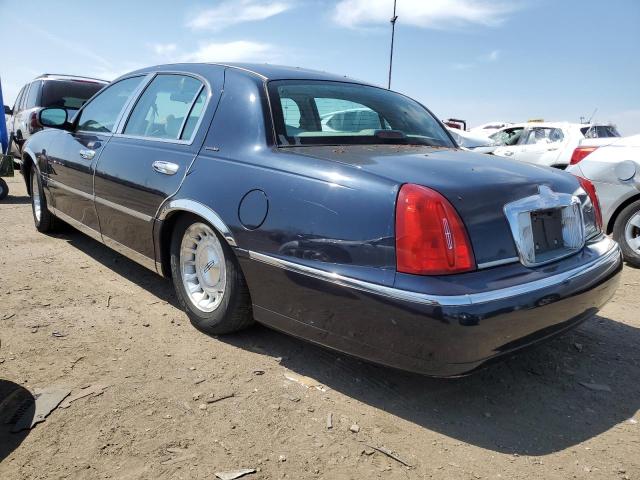 Photo 2 from auction – 1999 LINCOLN TOWN CAR E with VIN 1LNHM81W7XY669205