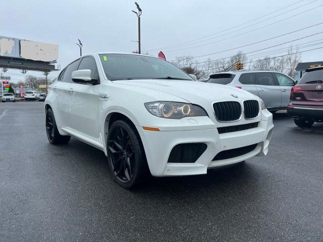 BMW X6 M 2011 with VIN 5YMGZ0C5XBLK14126 - Photo from auction