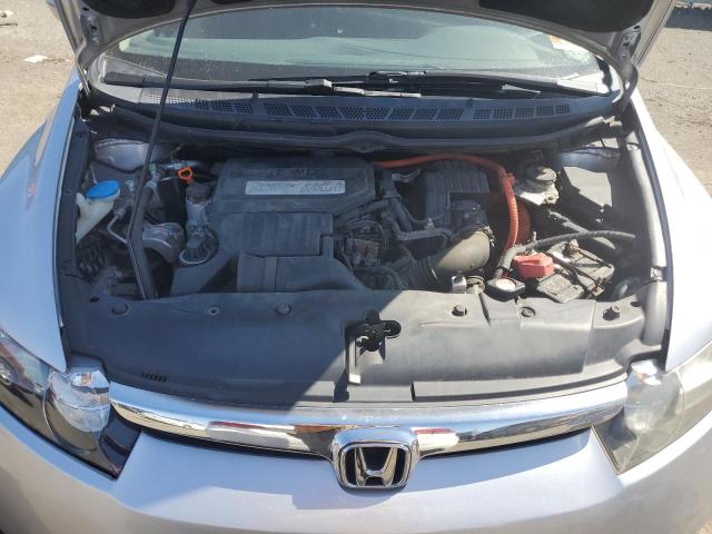 Photo 11 from auction – 2006 HONDA CIVIC HYBR with VIN JHMFA36236S009465