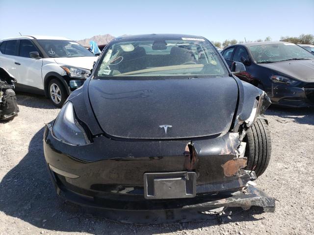 Photo 5 from auction – 2022 TESLA MODEL 3 with VIN 5YJ3E1EB1NF187451