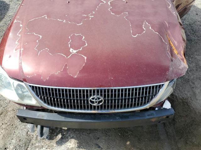 Photo 11 from auction – 2002 TOYOTA AVALON XL with VIN 4T1BF28BX2U215949