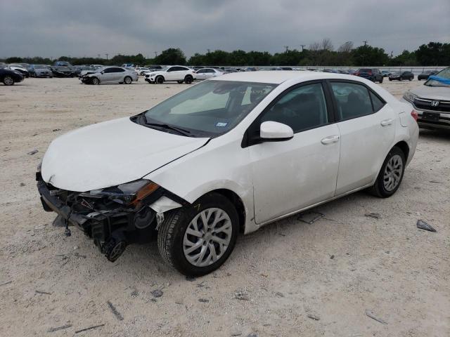 TOYOTA COROLLA L 2019 with VIN 5YFBURHE5KP873267 - Photo from auction