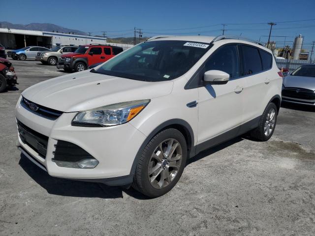 FORD ESCAPE TIT 2015 with VIN 1FMCU0JX2FUB31117 - Photo from auction