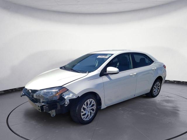 TOYOTA COROLLA L 2018 with VIN 5YFBURHE0JP844418 - Photo from auction
