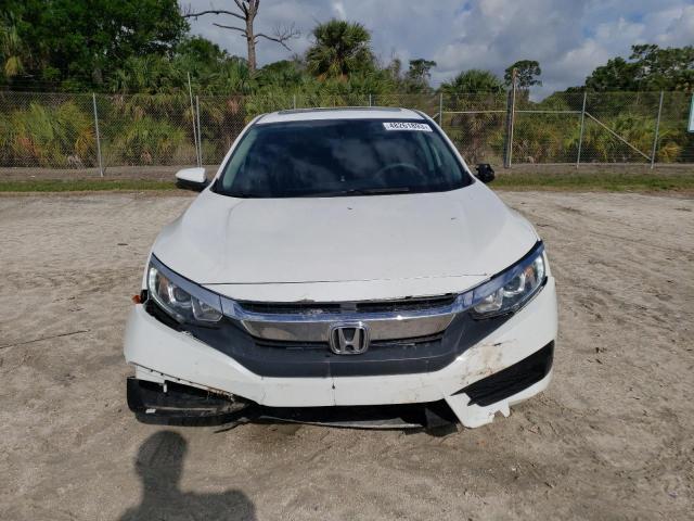 Photo 5 from auction – 2018 HONDA CIVIC EX with VIN 19XFC2F73JE007678