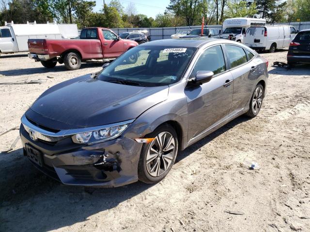 HONDA CIVIC EX 2018 with VIN JHMFC1F38JX026829 - Photo from auction