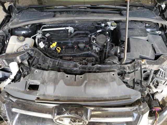 Photo 11 from auction – 2014 FORD FOCUS TITA with VIN 1FADP3N2XEL184965