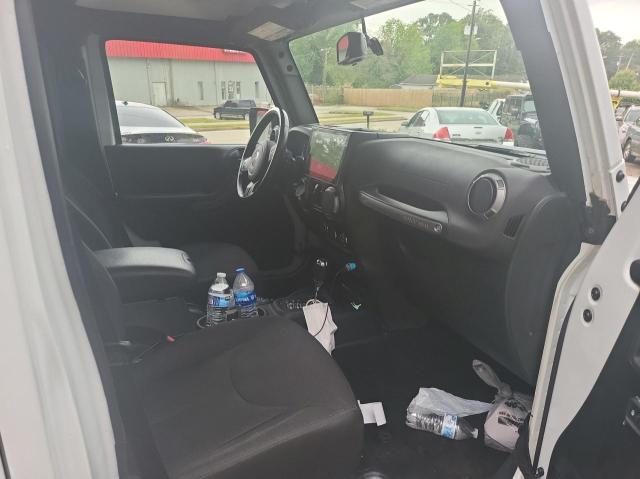 Photo 5 from auction – 2015 JEEP WRANGLER U with VIN 1C4BJWDG1FL557023