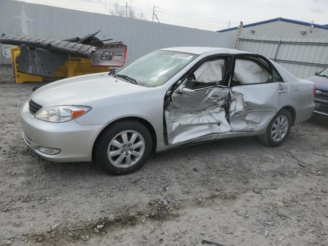 TOYOTA CAMRY LE 2003 with VIN 4T1BE30K73U706937 - Photo from auction