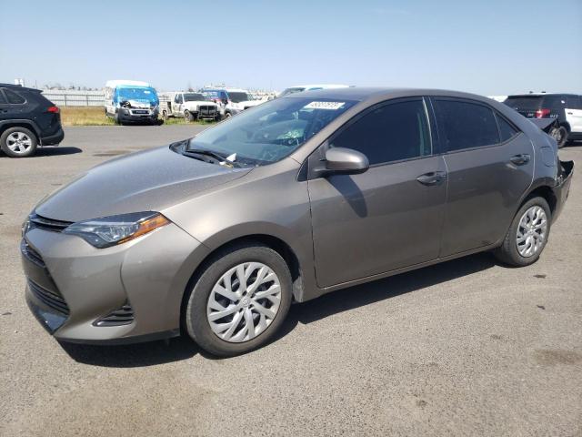 TOYOTA COROLLA L 2019 with VIN 5YFBURHE6KP933797 - Photo from auction