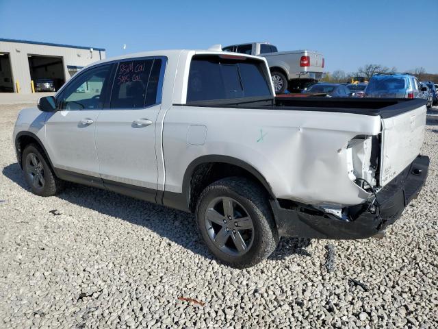 Photo 2 from auction – 2022 HONDA RIDGELINE with VIN 5FPYK3F58NB038609