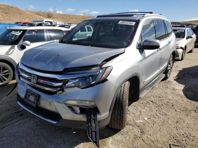 HONDA PILOT TOUR 2016 with VIN 5FNYF6H98GB104853 - Photo from auction