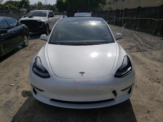 Photo 5 from auction – 2021 TESLA MODEL 3 with VIN 5YJ3E1EA1MF014647