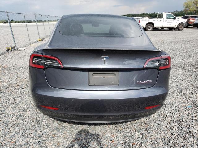 Photo 6 from auction – 2021 TESLA MODEL 3 with VIN 5YJ3E1EC2MF061865