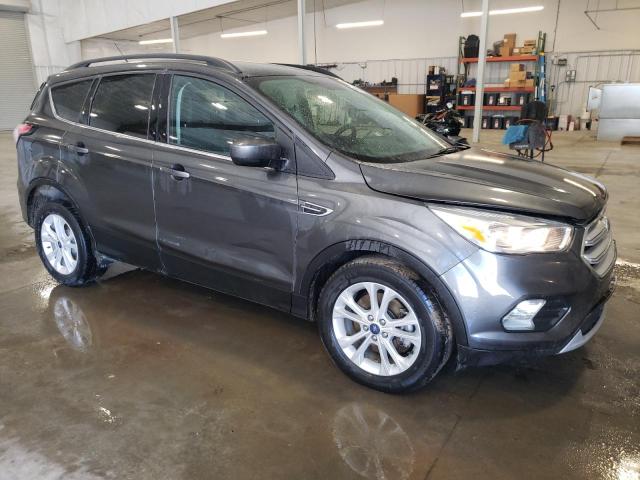 Photo 4 from auction – 2018 FORD ESCAPE SE with VIN 1FMCU9GD9JUA34412