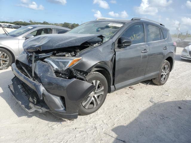TOYOTA RAV4 LE 2018 with VIN 2T3ZFREV4JW506281 - Photo from auction