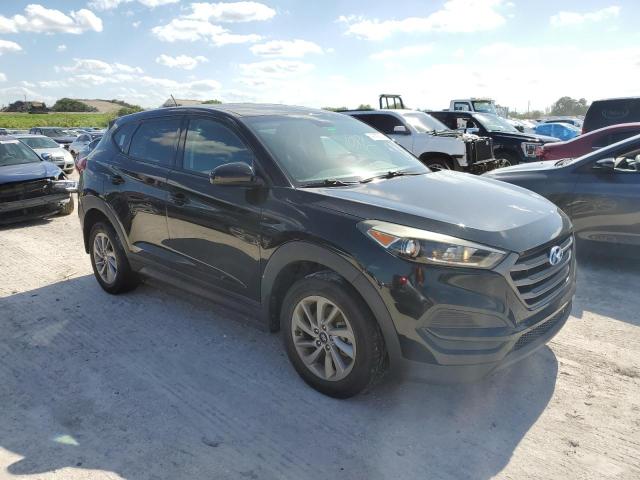 Photo 4 from auction – 2016 HYUNDAI TUCSON SE with VIN KM8J23A40GU253240