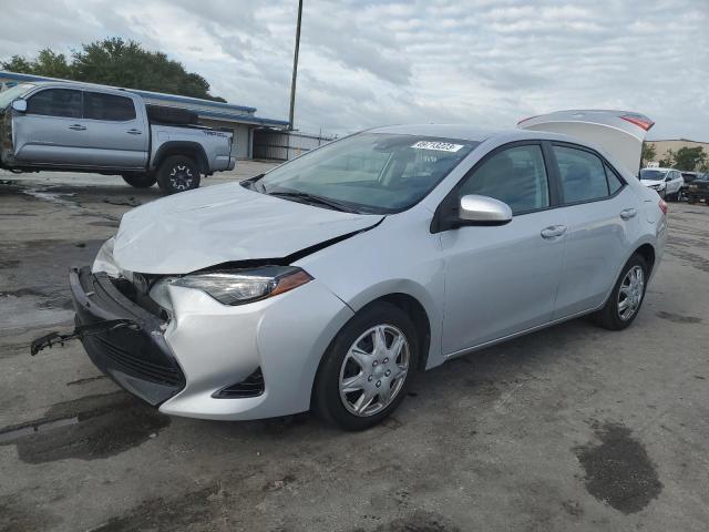 TOYOTA COROLLA L 2018 with VIN 5YFBURHE6JP775797 - Photo from auction