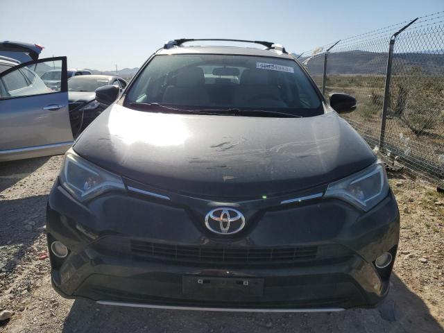 Photo 5 from auction – 2016 TOYOTA RAV4 XLE with VIN 2T3RFREV6GW427722