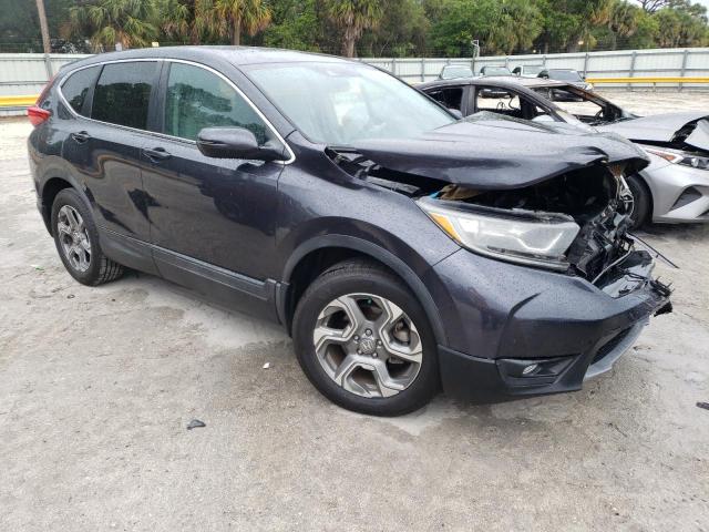 Photo 4 from auction – 2017 HONDA CR-V EXL with VIN 7FARW1H84HE037429