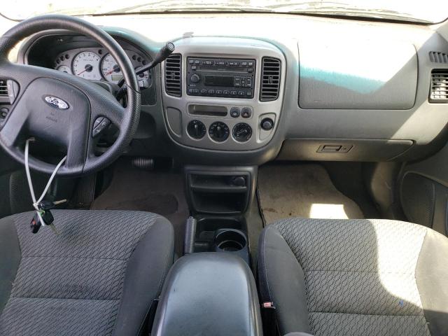 Photo 8 from auction – 2003 FORD ESCAPE XLT with VIN 1FMYU031X3KC04773