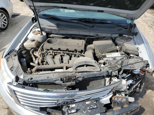 Photo 11 from auction – 2009 KIA OPTIMA LX with VIN KNAGE228295298546