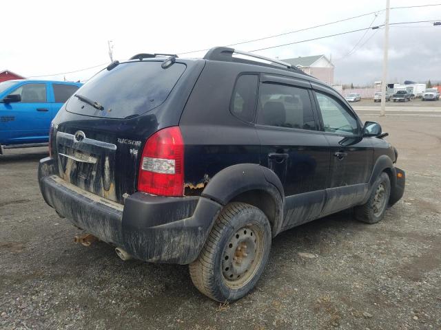 Photo 3 from auction – 2005 HYUNDAI TUCSON GL with VIN KM8JM72D05U169528